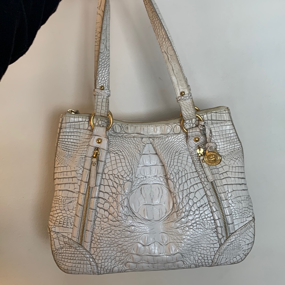 White Brahmin purse with crocodile print leather.